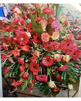 Shades of Red Casket Spray